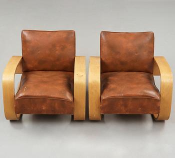 Alvar Aalto, a pair of 'tank chairs' model 400, Huonekalu-ja Rakennustyötehdas Oy for Artek, Finland 1940's-50's.