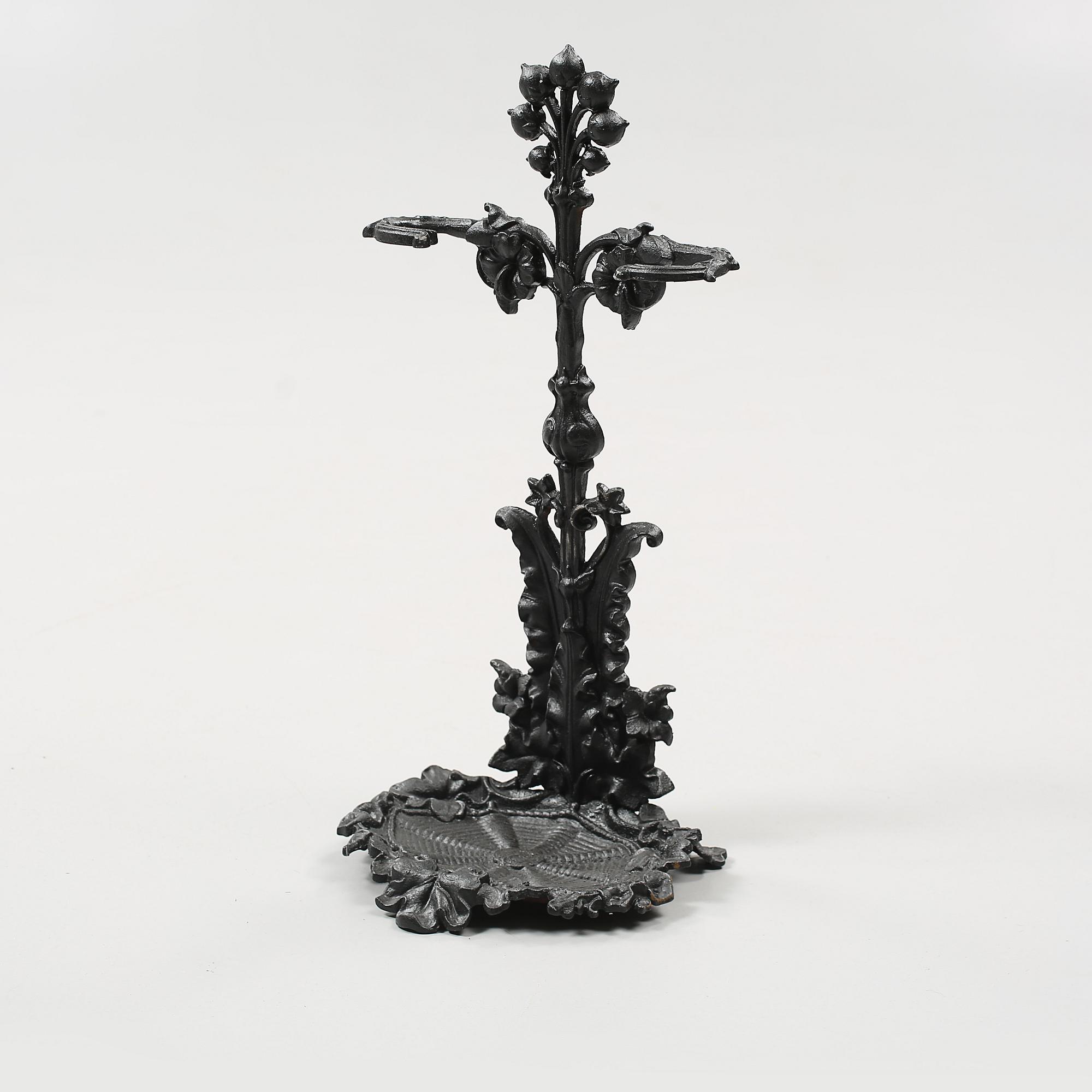 PARAPLYSTÄLL, gjutjärn, 1900-talets första hälft.