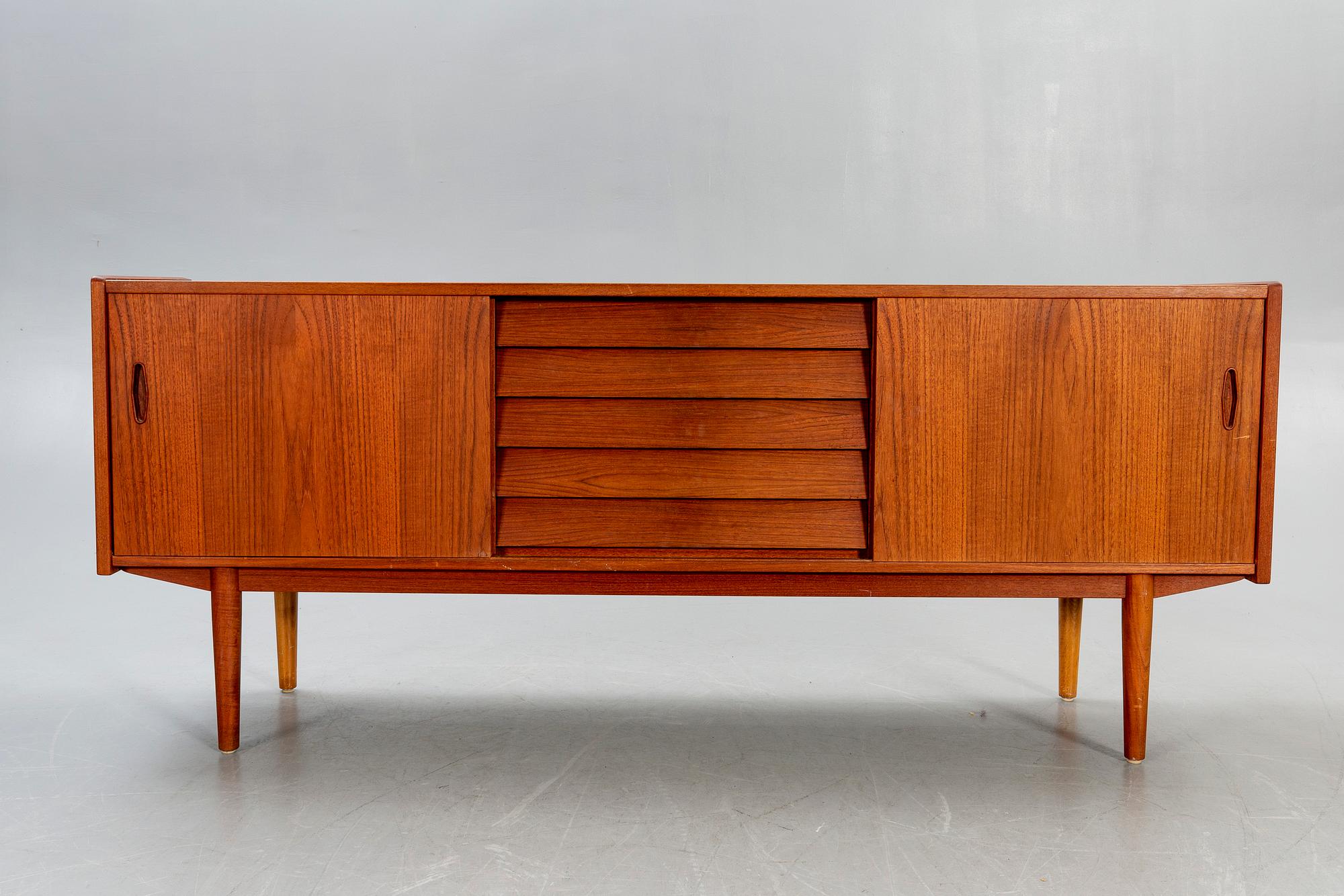 Nils Jonsson, a trio teak sideboard from Troeds later part of the 20th century.