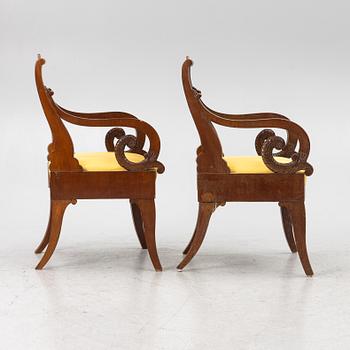 A pair of Russian/Baltic Empire mahogany armchairs, 1830's/40's.