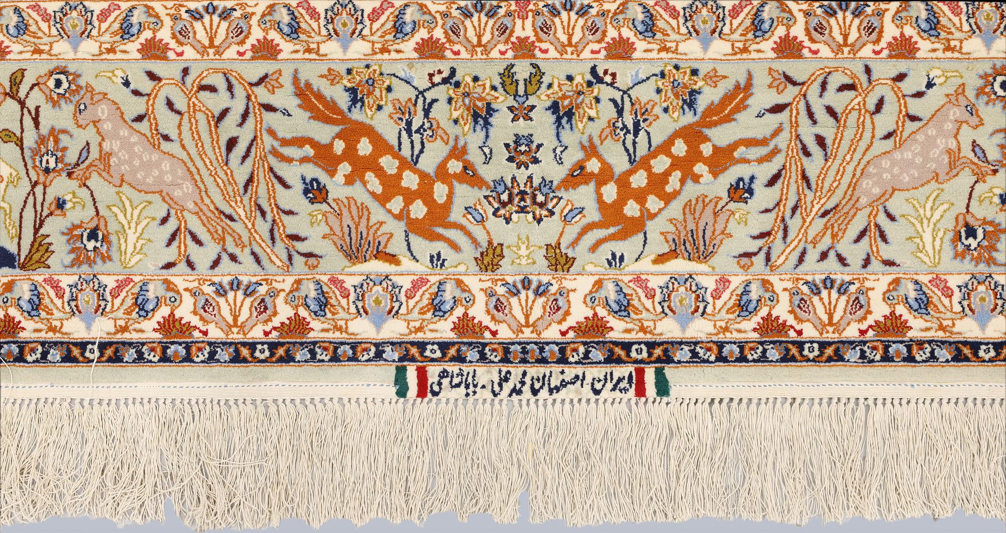 A Figural Isfahan carpet, part silk, 238 x 160 cm.