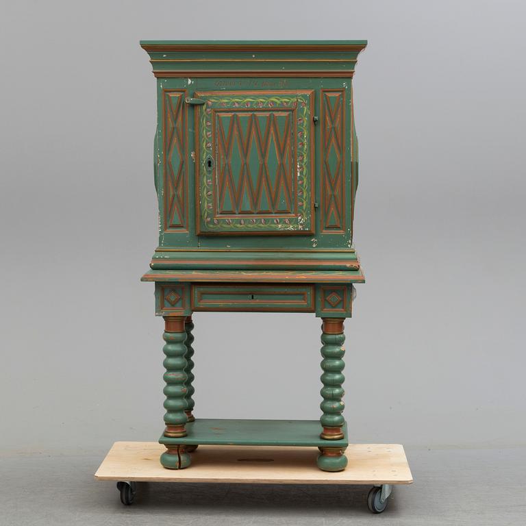 A second half of the 19th century wall cabinet with stand.