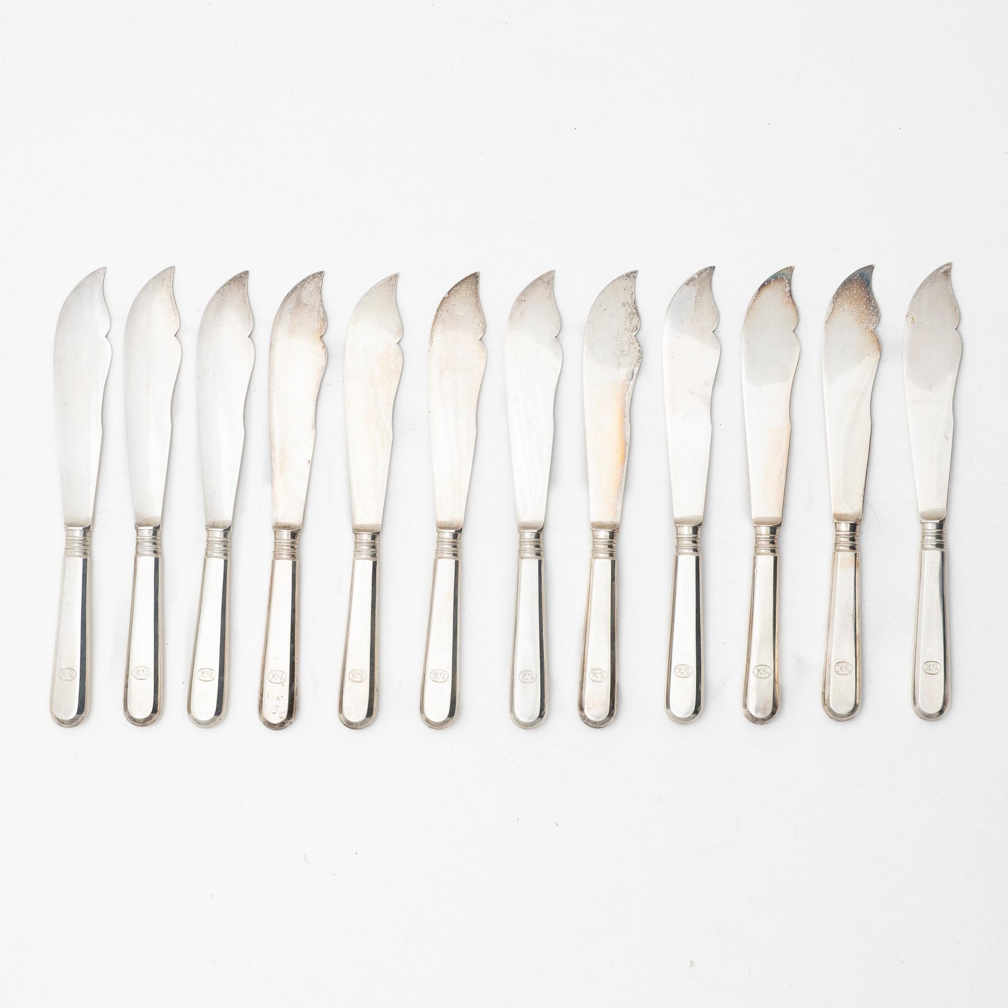 A Russian silver cutlery set, including mark of Ovchinnikov with the Imperial warrant, St Petersburg 1908-16 (24 pieces).