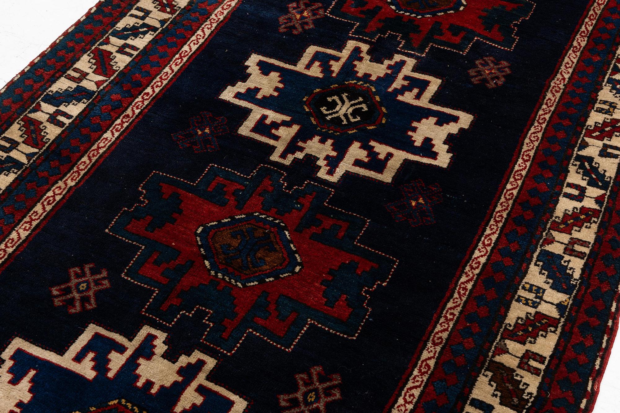 A Lesghi rug, North East Caucasus, signed, c. 230 x 135 cm.