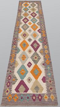 A Kilim runner, approx. 291 x 70 cm.