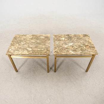 A pair of metal and stone side tables from the second half of the 20th century.