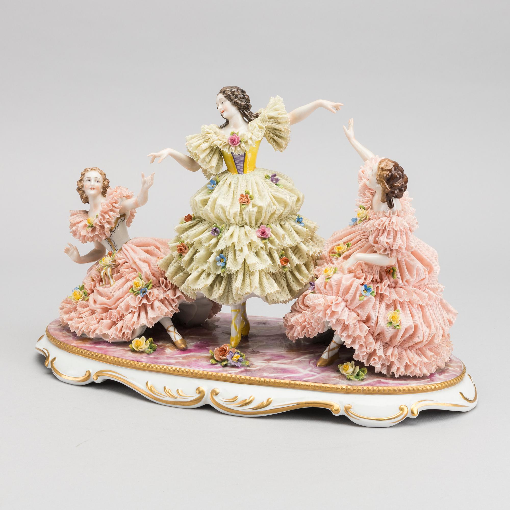 A porcelain figurine with Capodimonte looking mark.