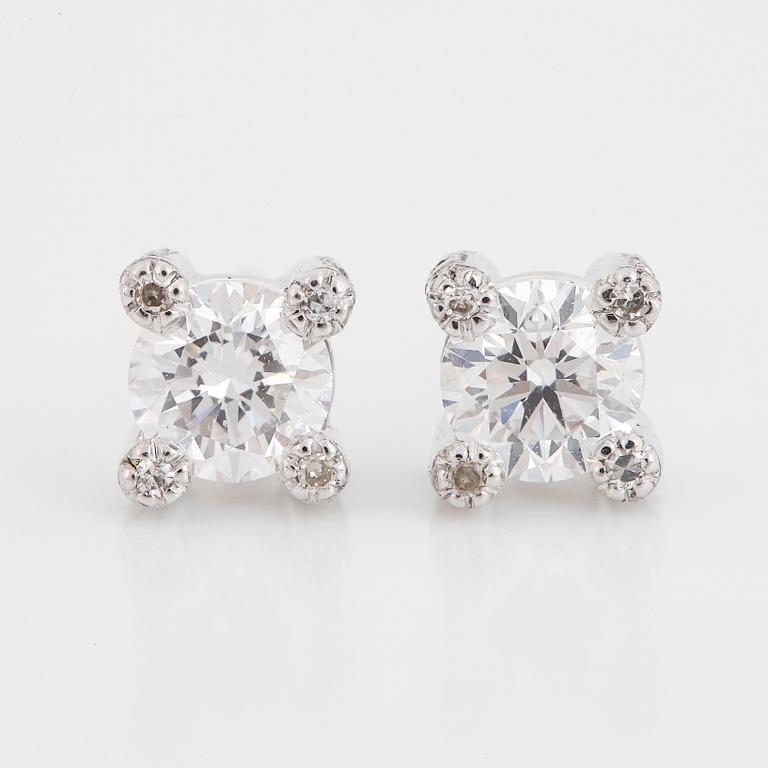 Brilliant-cut diamond stud earrings.
