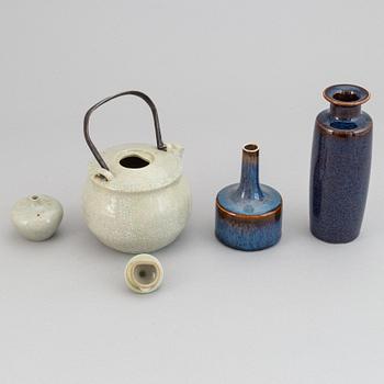 Carl-Harry Stålhane, a stoneware teapot and a set of three vases, Rörstrand, second half of the 20th Century.
