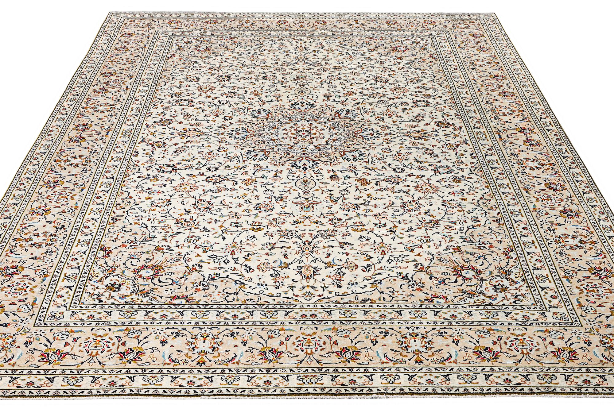 A Kashan carpet, c. 403 x 300 cm.