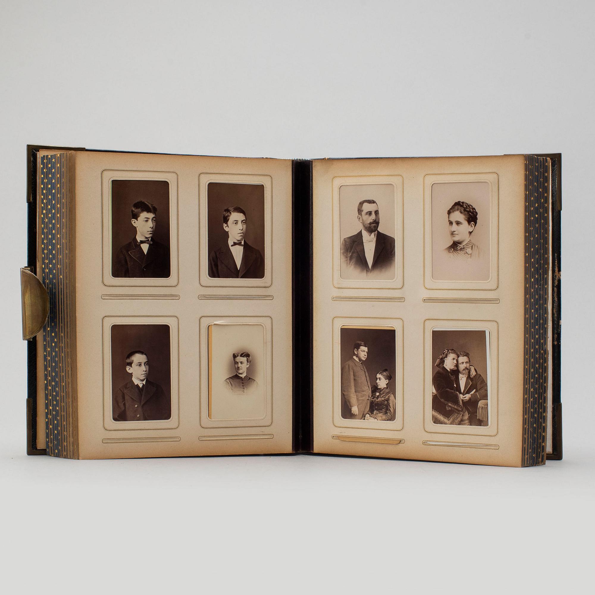 A PHOTO ALBUM, ca 150 photos, secod half of the 19th century.