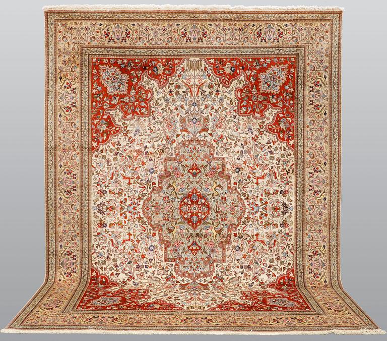 A carpet, Figural Tabriz, so called,  Tabatabai, 380 x 282 cm.