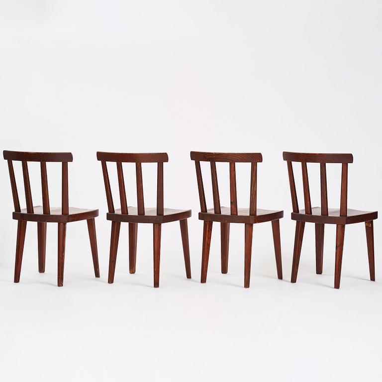 Axel Einar Hjorth, a set of four stained pine 'Utö' chairs, Nordiska Kompaniet Sweden 1930's.