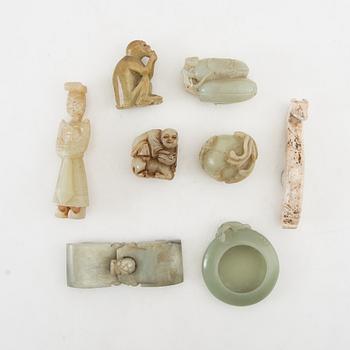 Figurines, belt buckles etc. China.