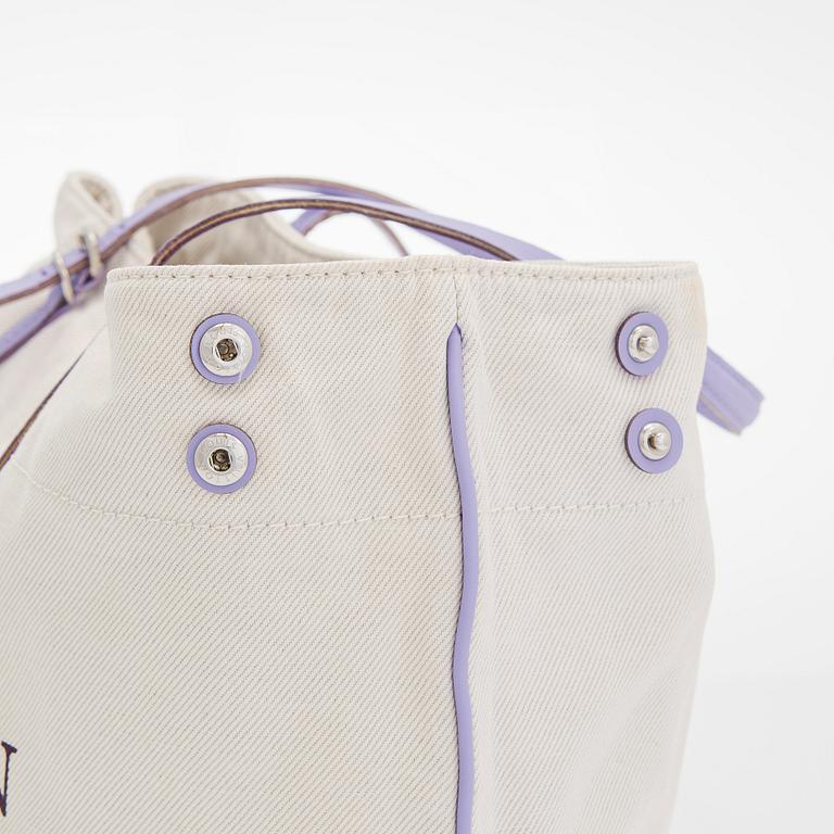 Louis Vuitton, a 'Cotton Canvas Articles De Voyage Cabas GM' bag.