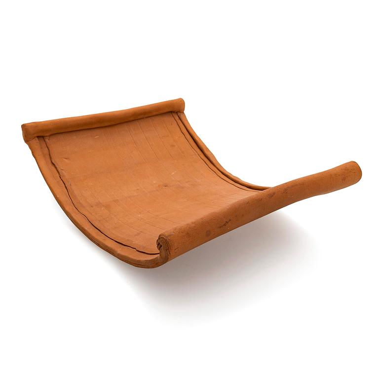 Kyllikki Salmenhaara, a 'winding' red clay sculpture, signed KS.