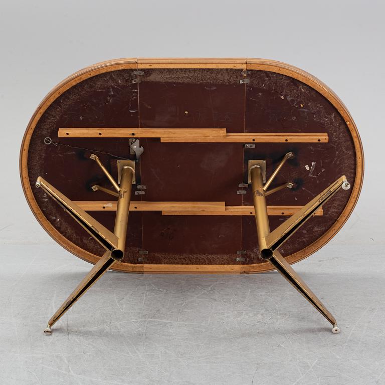 A dining table with four chairs, Walter of Wabash, table dated 1960.