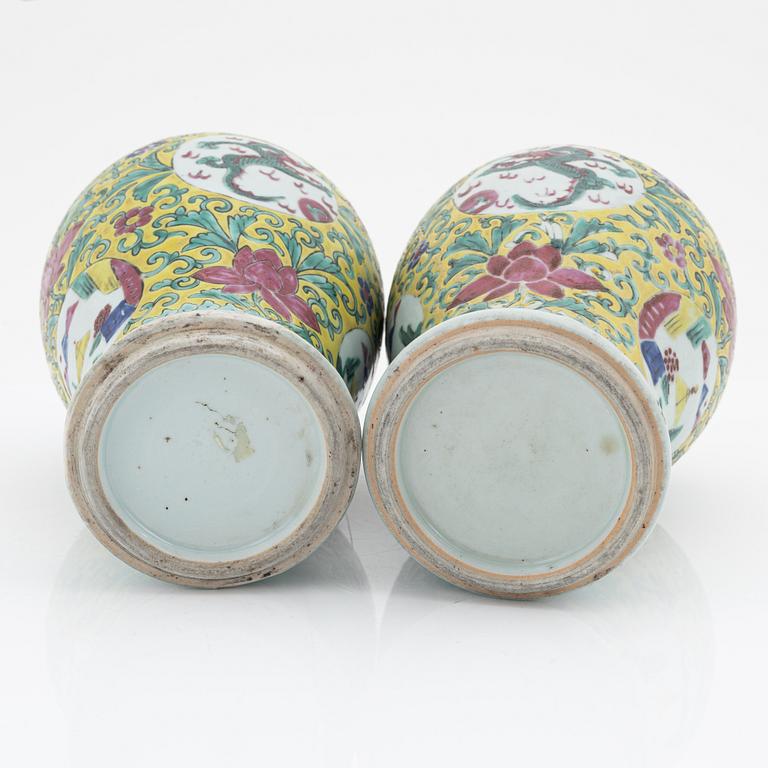 A pair of famille rose vases, China, early 20th Century.