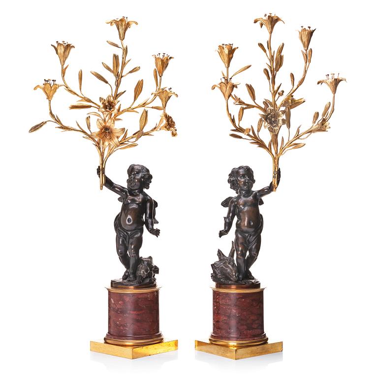 A pair of Louis XV/ Louis XVI five-light candelabra, second part of the 18th century.
