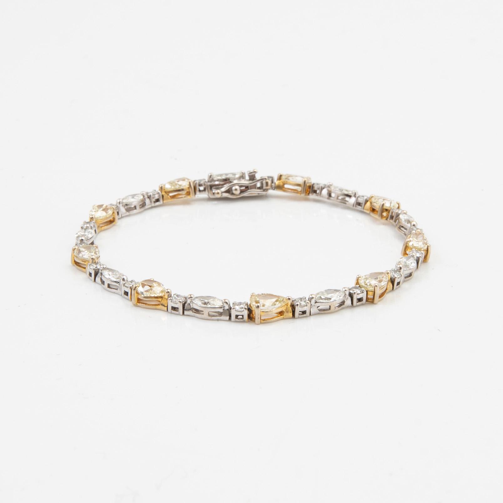 Armband, 18 k guld och vitguld med briljanter.