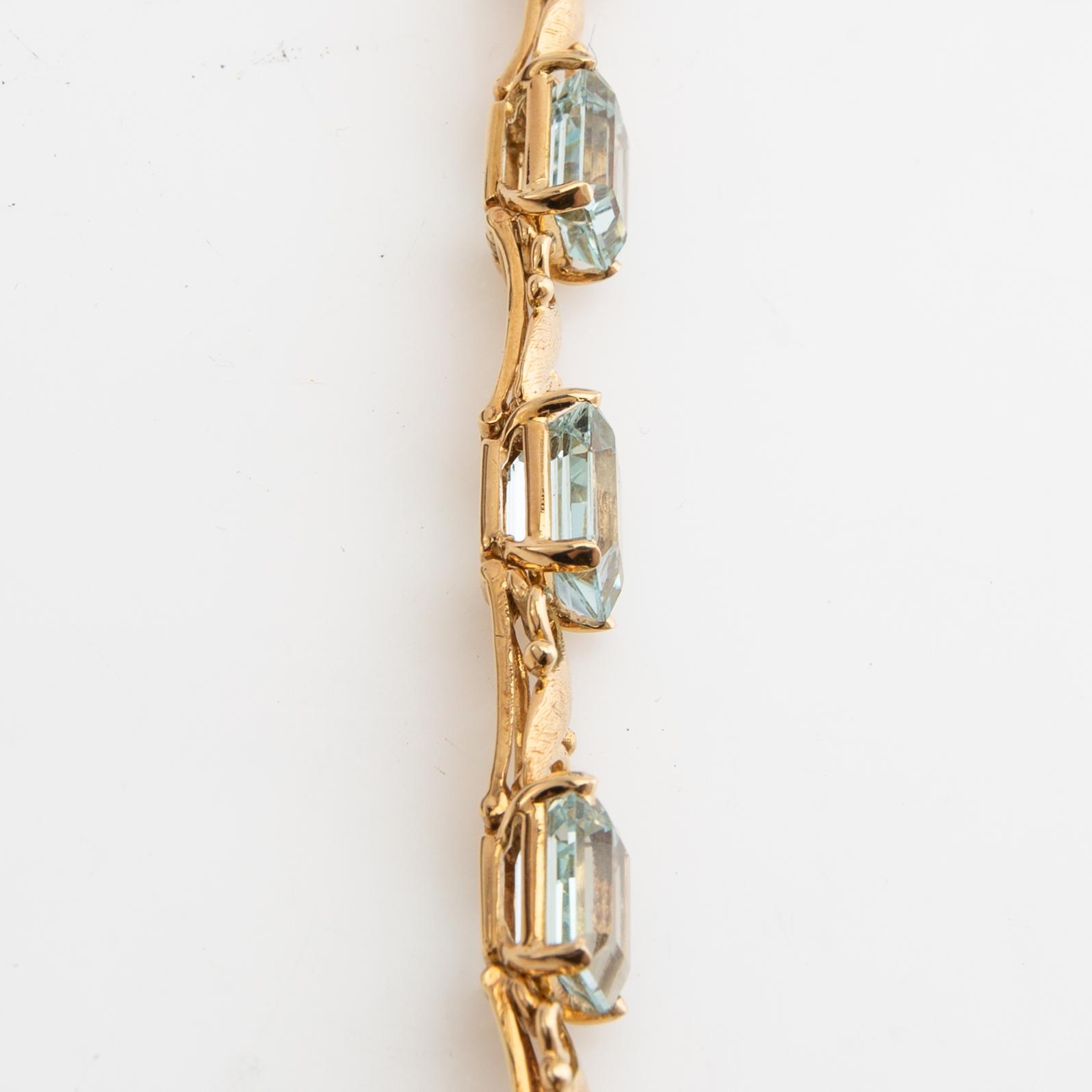 Armband, 18K guld med akvamariner.