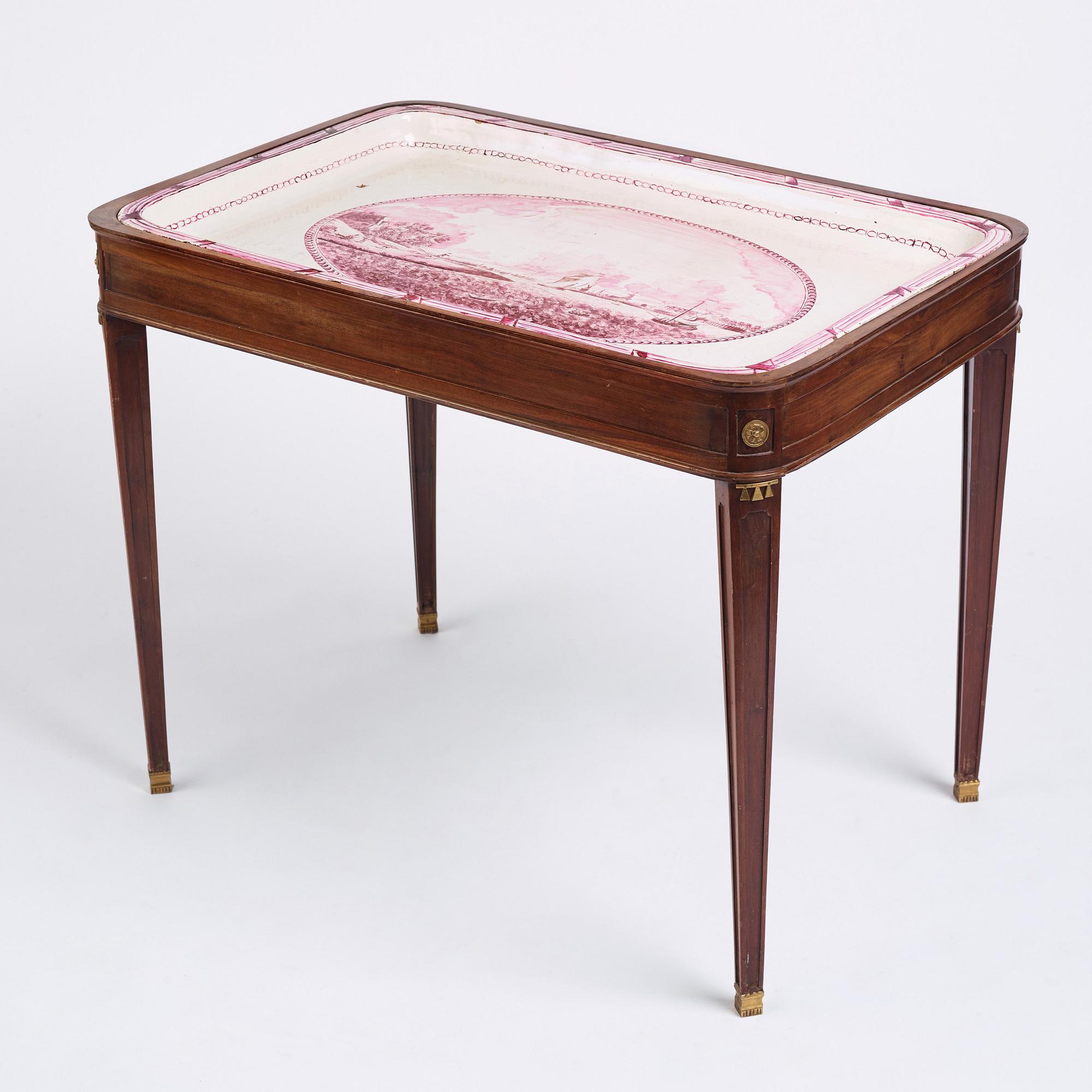 A Swedish Gustavian faience tea table, late 18th century.