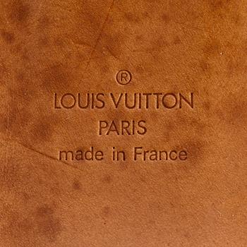 LOUIS VUITTON, a monogram canvas travelling bag "Sirius".