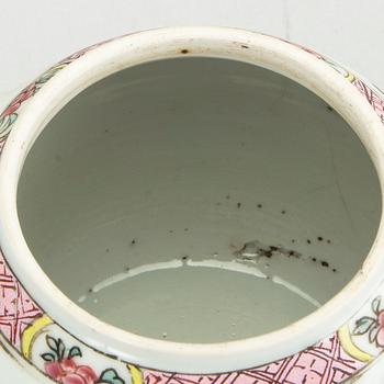A Chinese Qianlong pocelain teapot in famille rose colours.