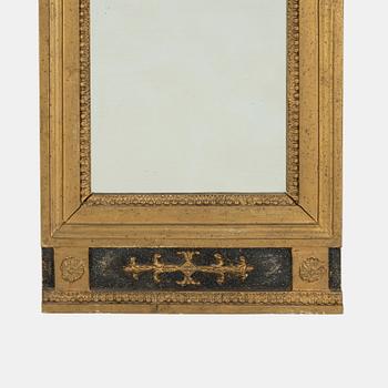 A Swedish Empire mirror, first half of the 19th Century.