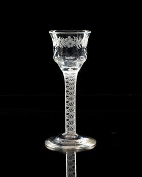 An engraved wine glass, 18th Century, presumably English.