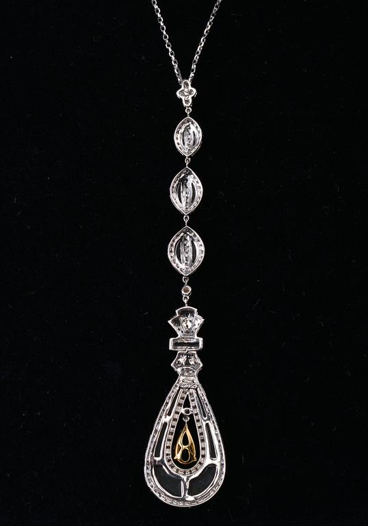 A PENDANT, Columbian emerald c. 1.46 ct, brilliant cut diamonds c. 1.20 ct, onyx. Weight 18 g.