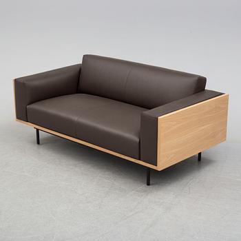 a 'Wood' sofa by Monica Förster, for Swedese.