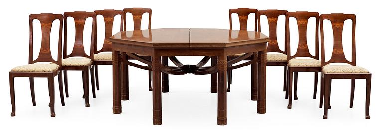 A Swedish Art Noveau mahogany dinner table with eight chairs, Kullman & Larsson, Malmö 1914.