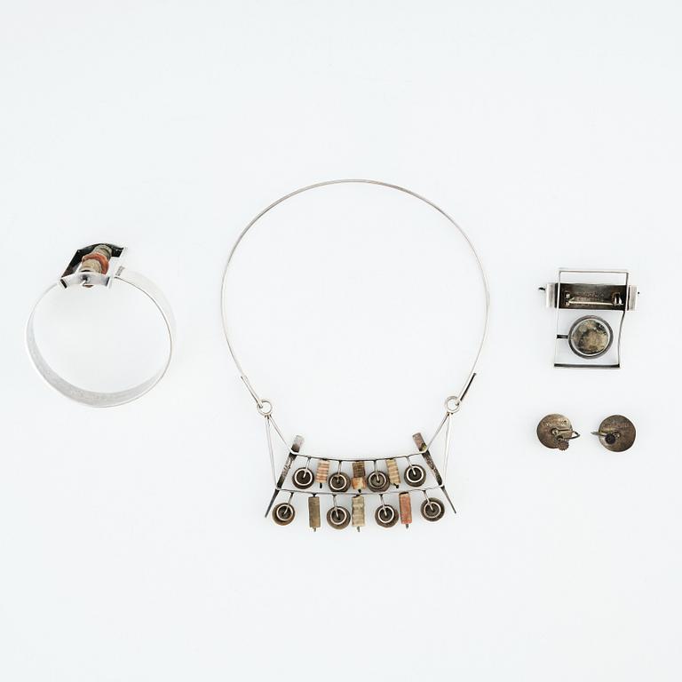 Inga-Britt "Ibe" Dahlquist, a sterling silver necklace, brooch (Olof Barve), earrings and a bangle executed in her own studio Malmö 1958-1959.
