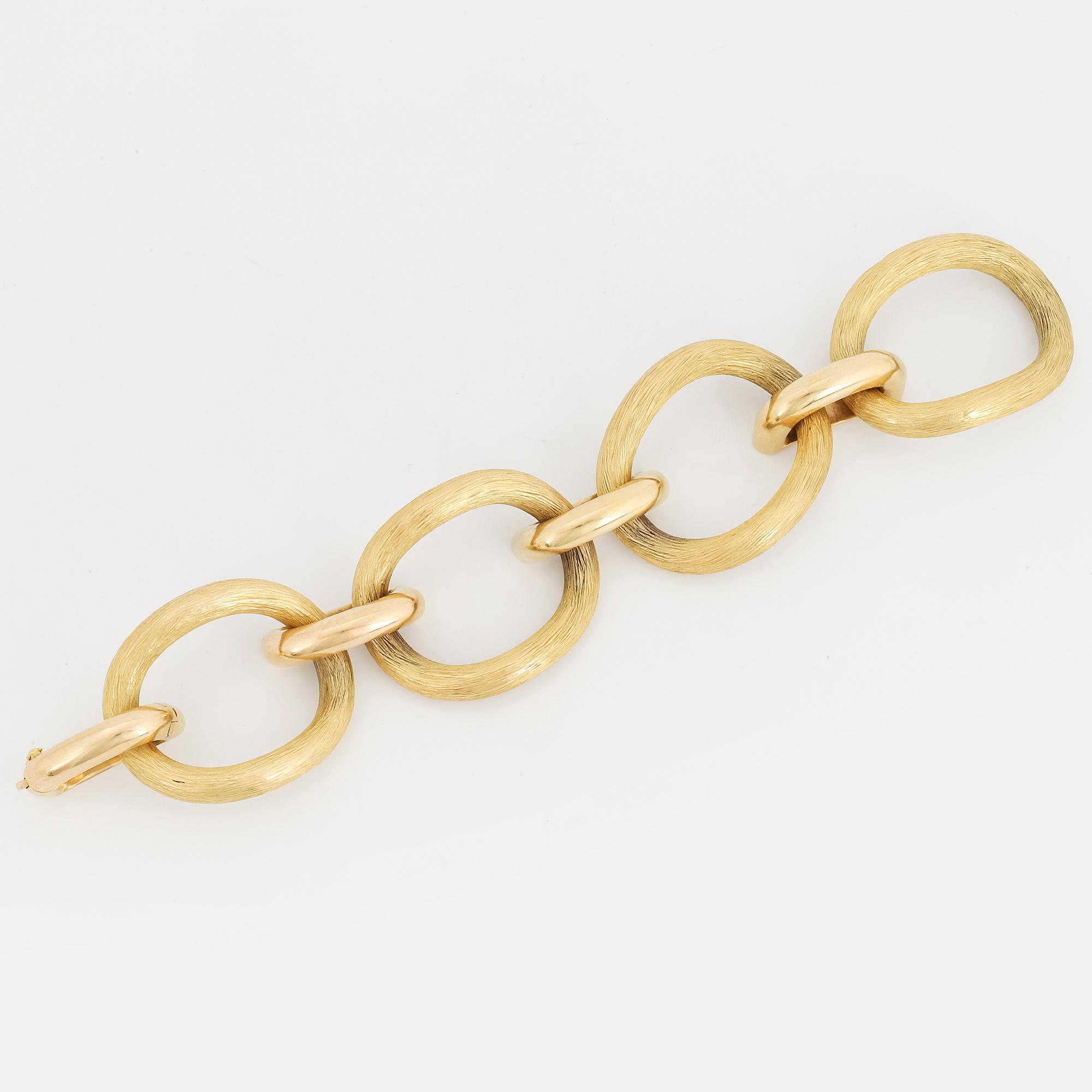 An 18K gold bracelet.