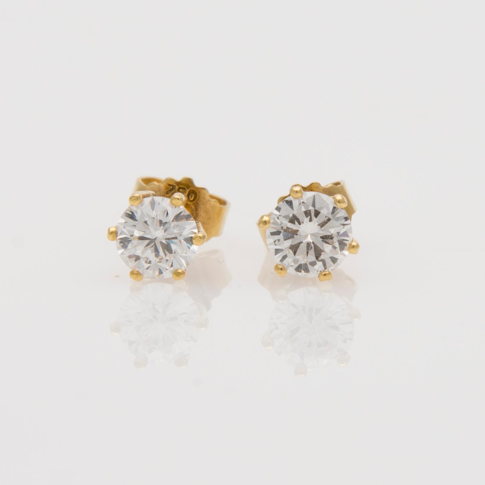 ÖRHÄNGEN, briljantslipade diamanter, 18K guld. Coster Diamonds.