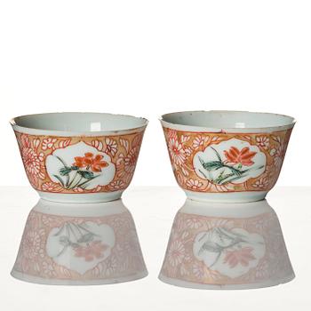 A pair of famille rose miniature cups with stands, Qing dynasty, 18th Century.