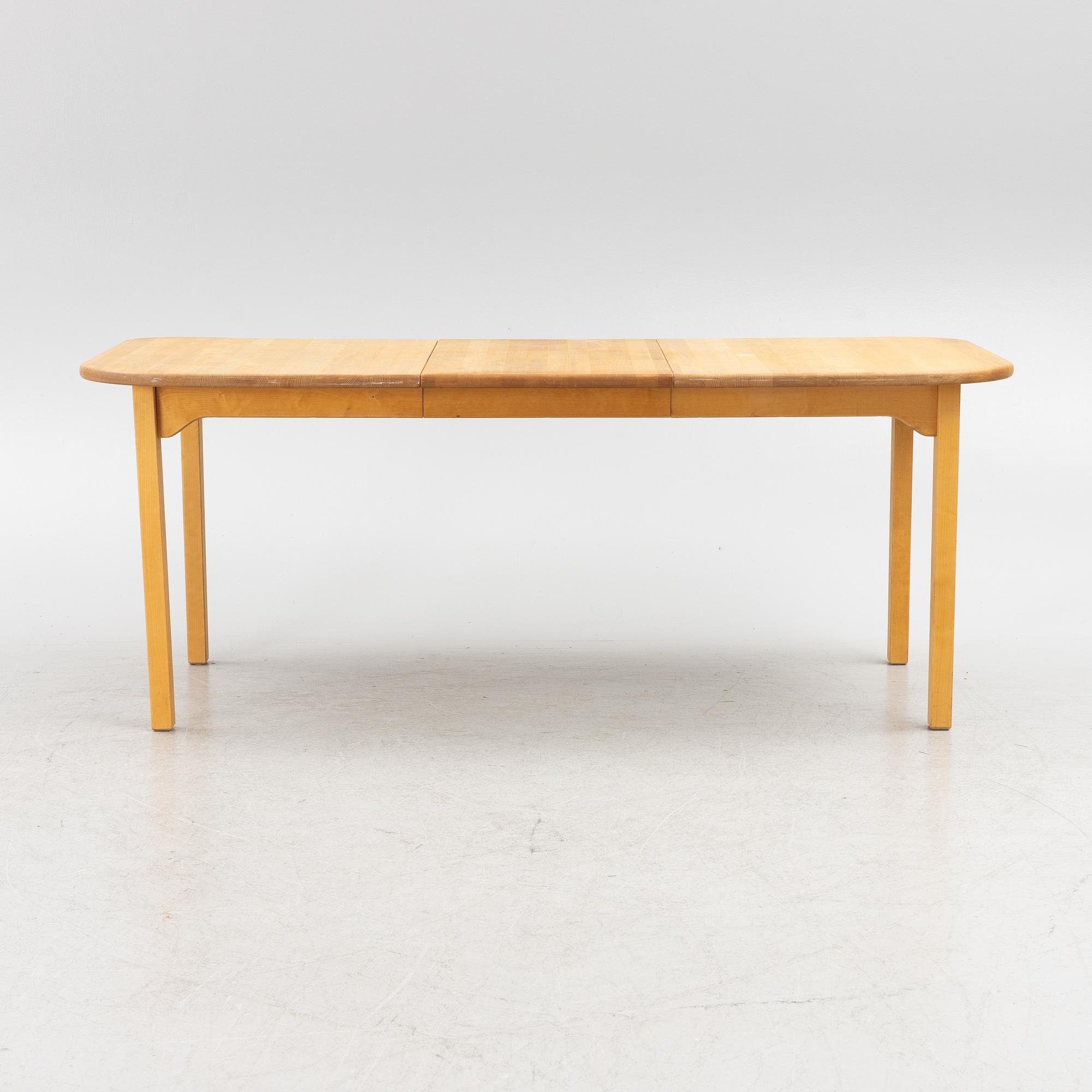 Carl Malmsten, six 'Lilla Åland' chairs, Stolab, 1990-92. Dining table, Stolab, 1989.