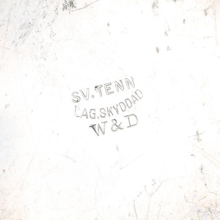 MANSCHETTKNAPPSASK, tenn, "Originell", Widerholm & Dahlberg, Eskilstuna, 1930/40-tal.