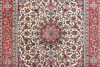 An Esfahan carpet, part silk, c. 304 x 204 cm.