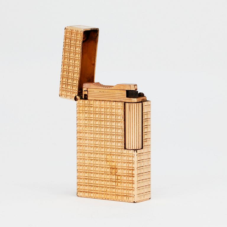 S T DUPONT, a gilded metal ligther.