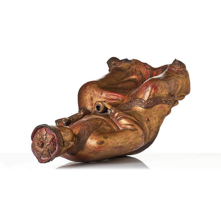 A large gilt lacquer figure of a deity, Vietnam, 19th century.