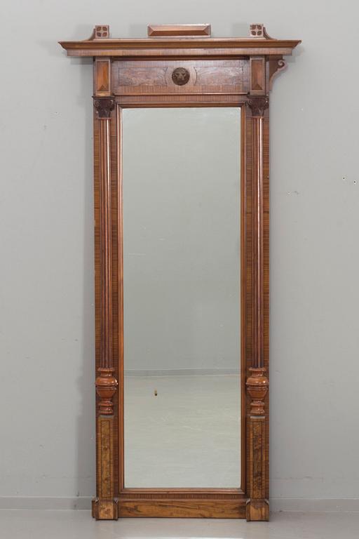 An early 20th century empire style mirror.