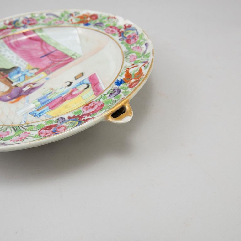 Three chinese famille rose dishes and one hot water dish, 18th and 19th century.