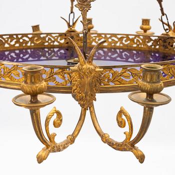 A gilt bronze sixteen-light Empire-style chandelier, later part of the 19th century.