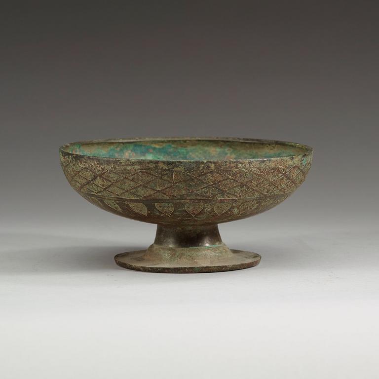 A Archaistic bronze lid for a dou vessel.