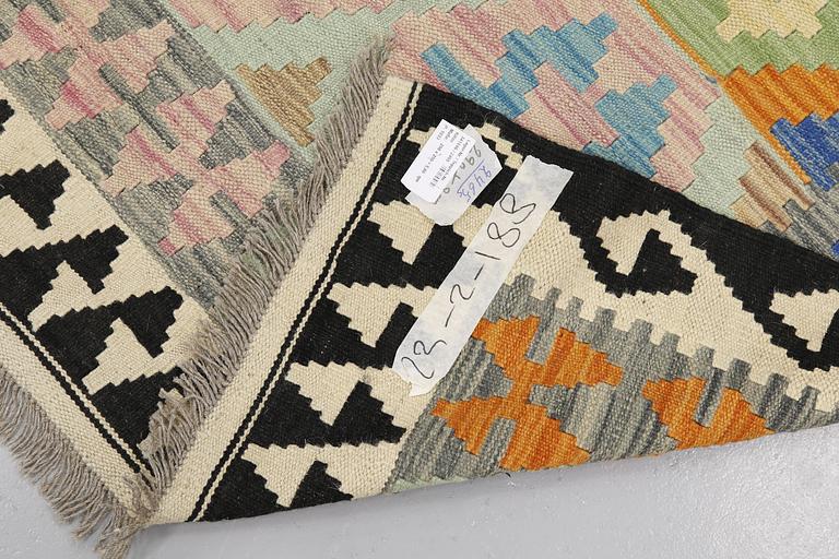A kilim carpet, ca 290 x 200 cm.