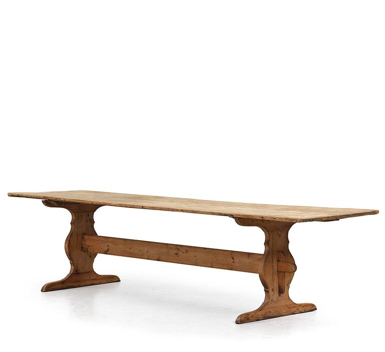 A pine trestle table, 20th century incorporating older elements.