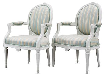 A pair of Gustavian late 18th Century armchairs.