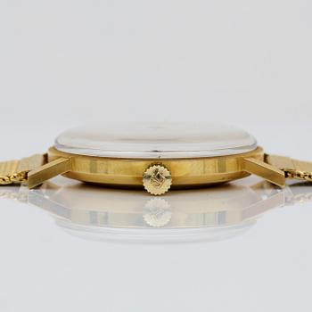 ARMBANDSUR, Tissot SeastarSeven, boetten 18 k.